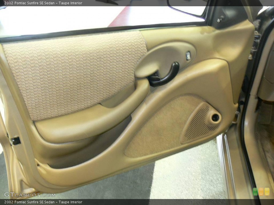 Taupe Interior Door Panel for the 2002 Pontiac Sunfire SE Sedan #23671272