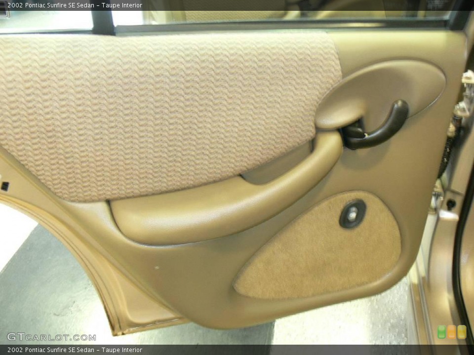 Taupe Interior Door Panel for the 2002 Pontiac Sunfire SE Sedan #23671308