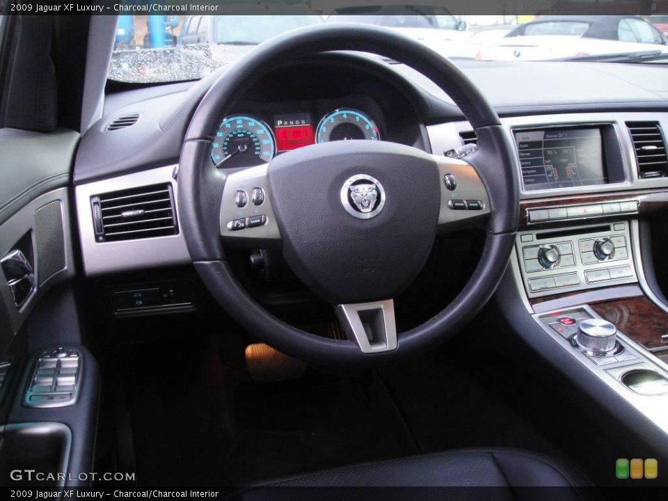 Charcoal/Charcoal Interior Steering Wheel for the 2009 Jaguar XF Luxury #24442055
