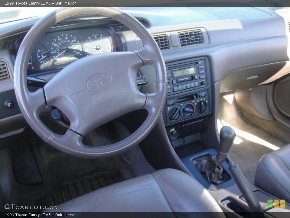 Oak Interior Dashboard for the 1999 Toyota Camry LE V6 #25721552