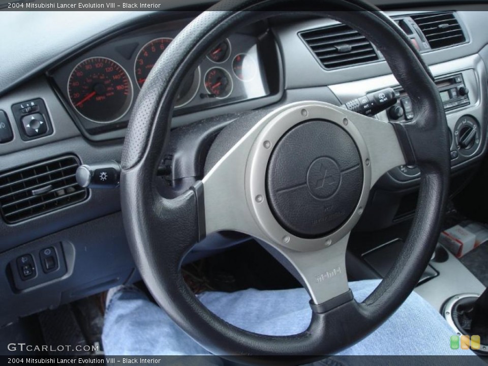 Black Interior Steering Wheel for the 2004 Mitsubishi Lancer Evolution VIII #25984224