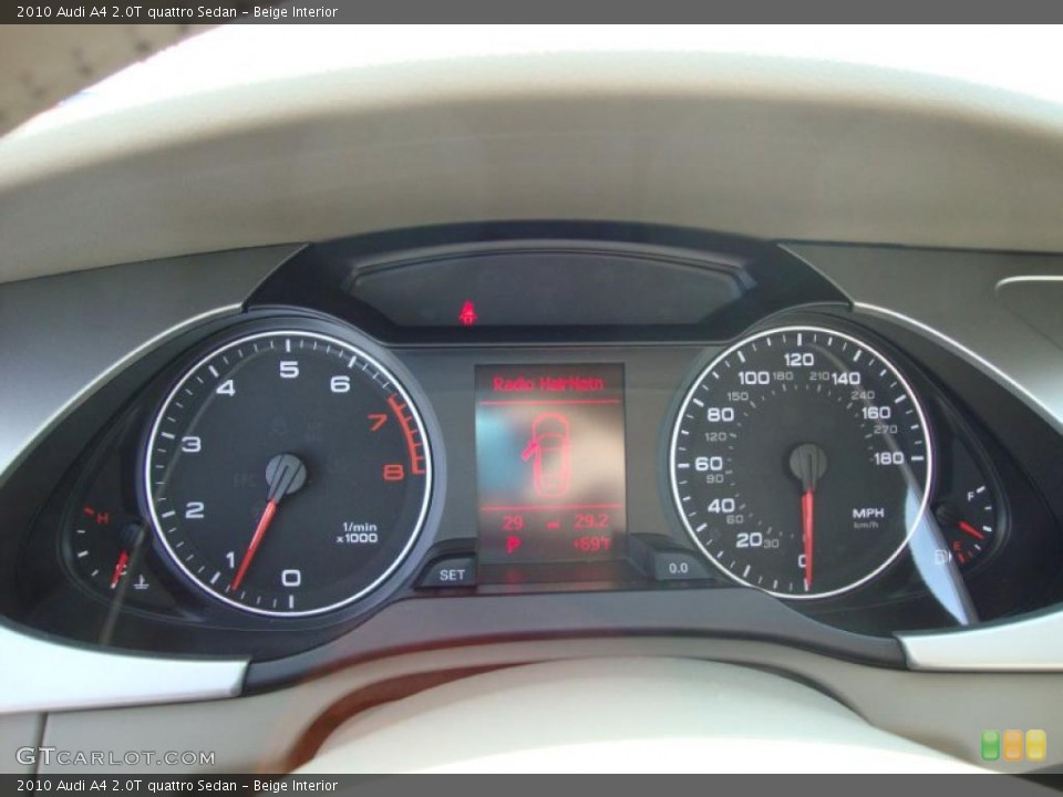 Beige Interior Gauges for the 2010 Audi A4 2.0T quattro Sedan #27387691