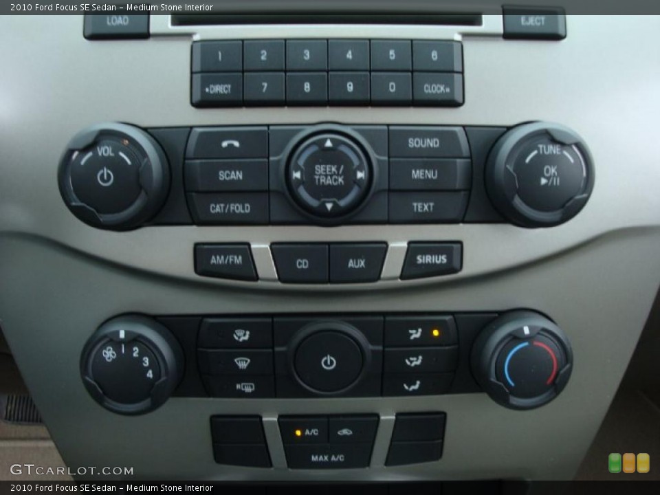 Medium Stone Interior Controls for the 2010 Ford Focus SE Sedan #27659706