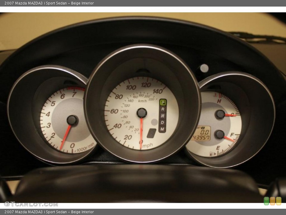 Beige Interior Gauges for the 2007 Mazda MAZDA3 i Sport Sedan #27732195