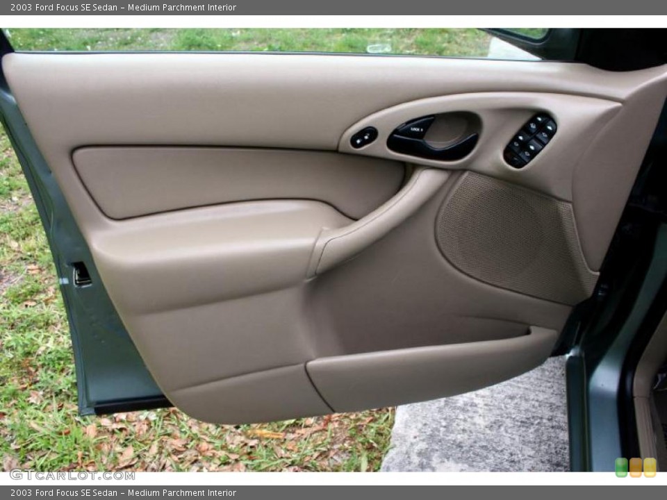 Medium Parchment Interior Door Panel for the 2003 Ford Focus SE Sedan #28626979