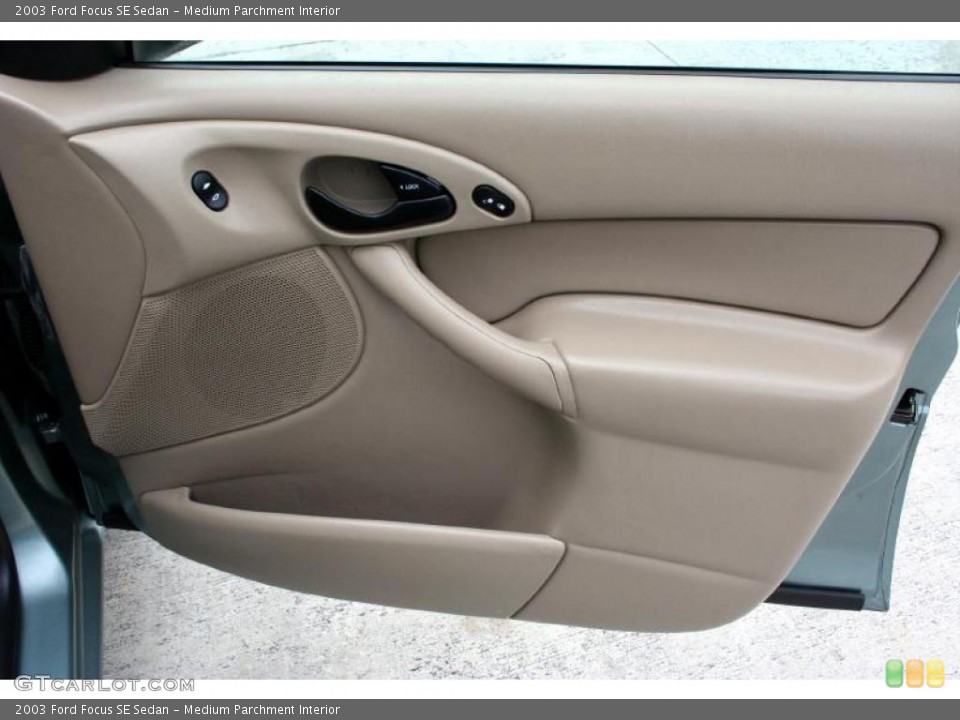 Medium Parchment Interior Door Panel for the 2003 Ford Focus SE Sedan #28626991