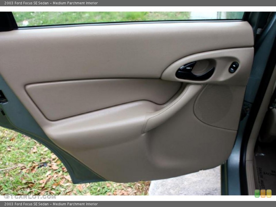 Medium Parchment Interior Door Panel for the 2003 Ford Focus SE Sedan #28627011