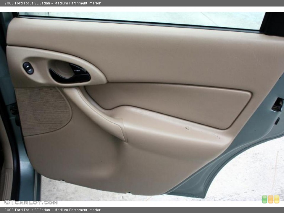 Medium Parchment Interior Door Panel for the 2003 Ford Focus SE Sedan #28627031