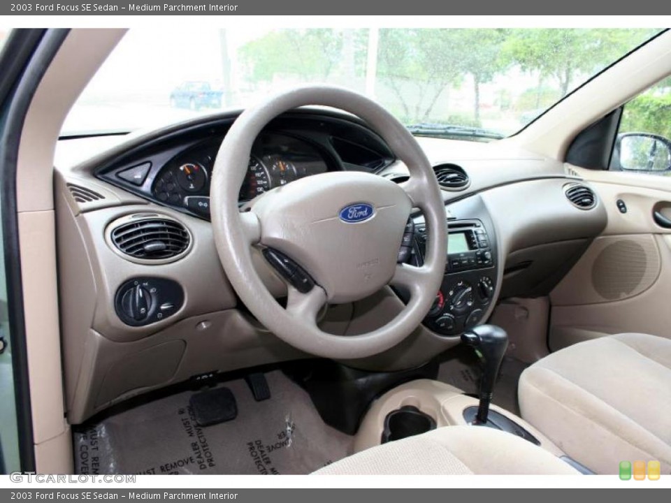 Medium Parchment Interior Photo for the 2003 Ford Focus SE Sedan #28627535