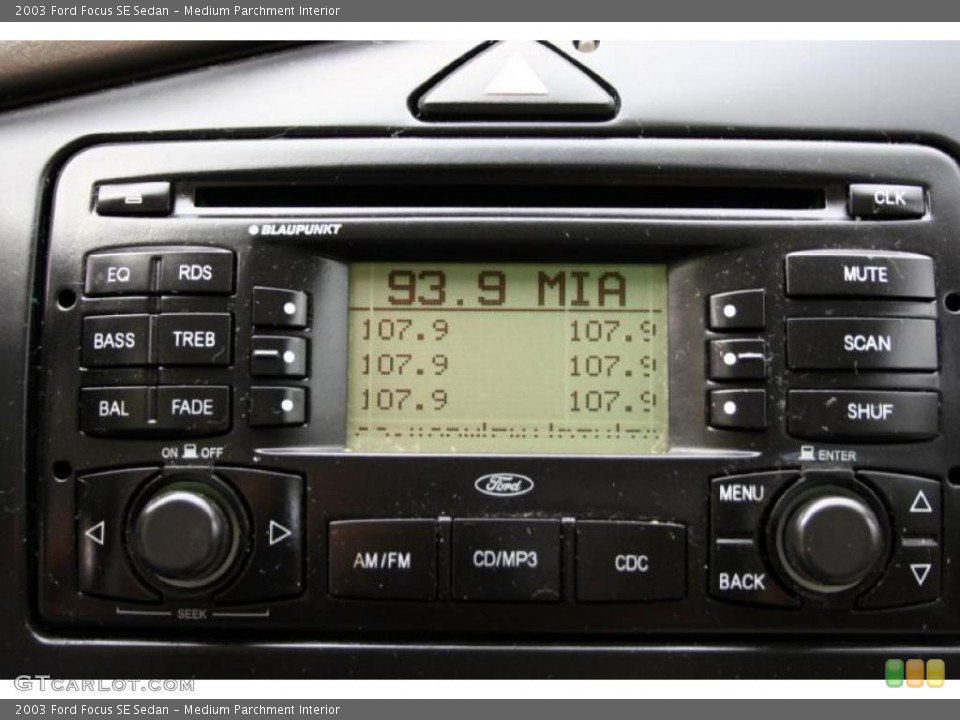 Medium Parchment Interior Controls for the 2003 Ford Focus SE Sedan #28627643
