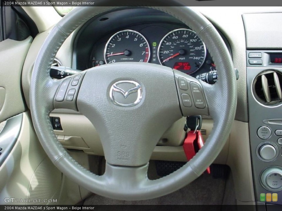 Beige Interior Steering Wheel for the 2004 Mazda MAZDA6 s Sport Wagon #28644562