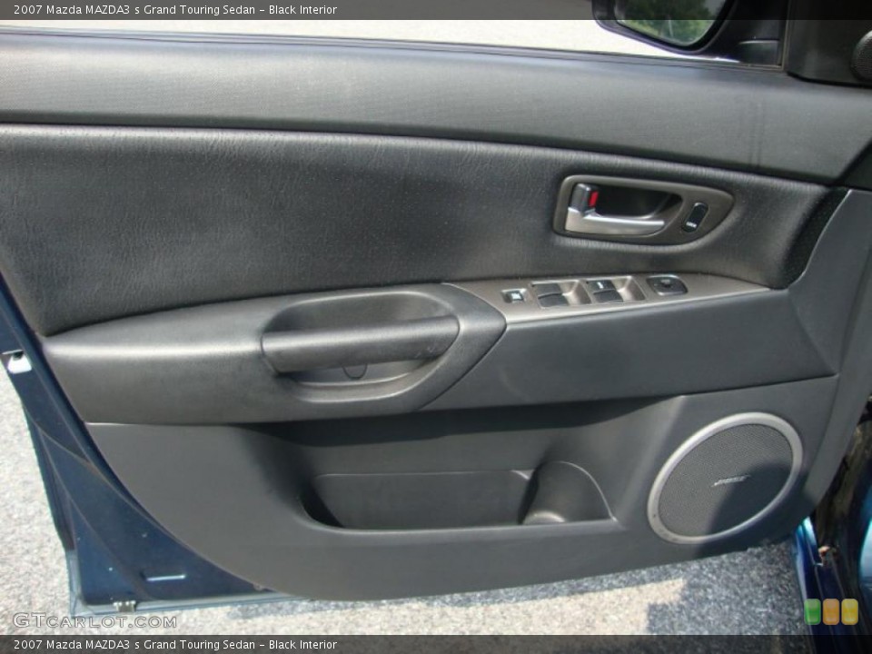 Black Interior Door Panel for the 2007 Mazda MAZDA3 s Grand Touring Sedan #32785819