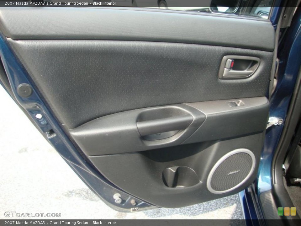 Black Interior Door Panel for the 2007 Mazda MAZDA3 s Grand Touring Sedan #32785979