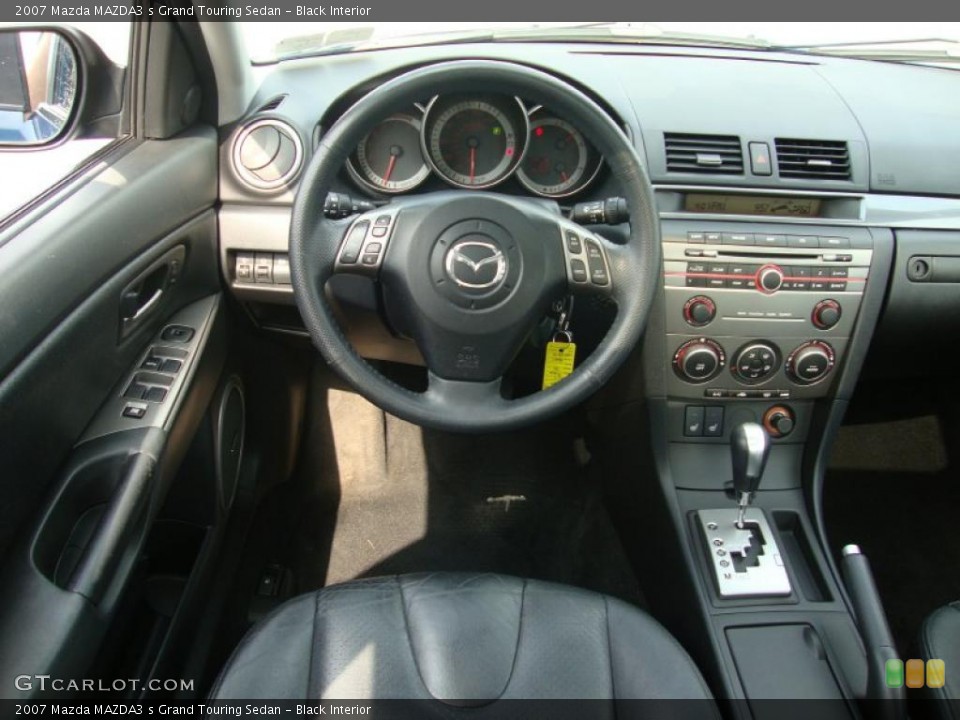 Black Interior Steering Wheel for the 2007 Mazda MAZDA3 s Grand Touring Sedan #32786027