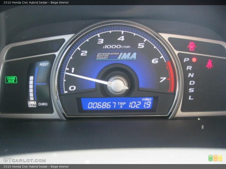 Beige Interior Gauges for the 2010 Honda Civic Hybrid Sedan #36777203