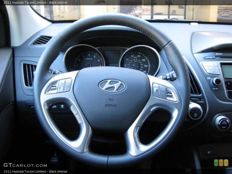 Black Interior Steering Wheel for the 2011 Hyundai Tucson Limited #37425762