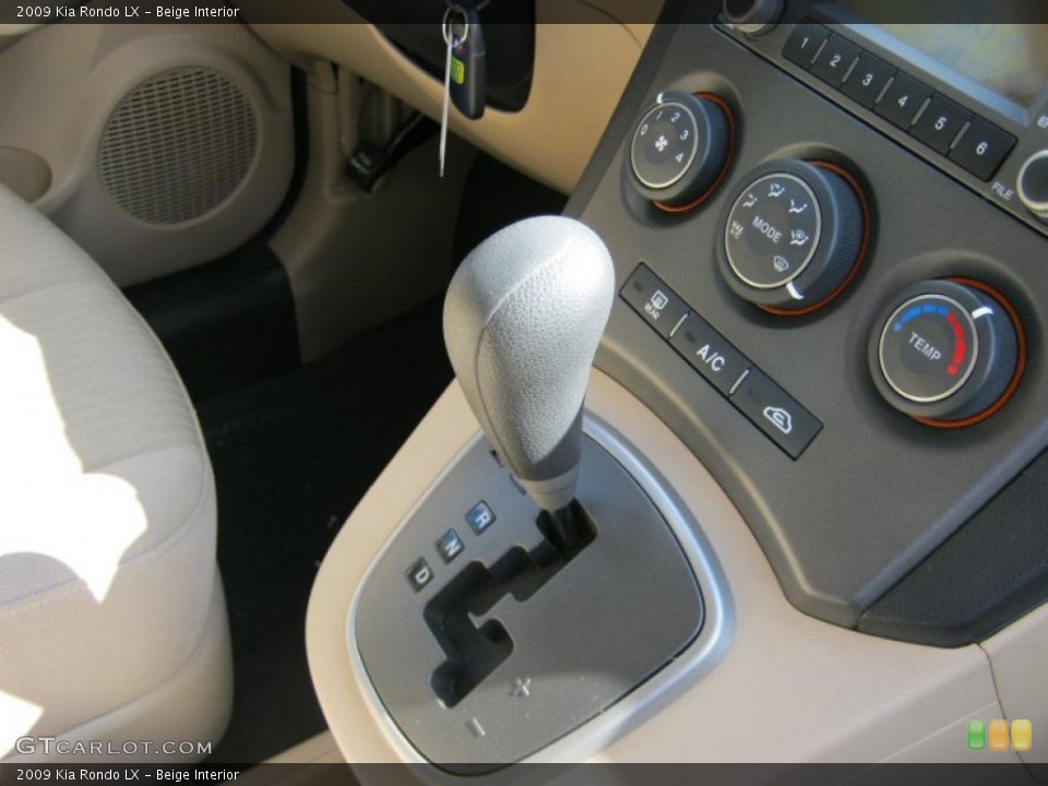 Beige Interior Transmission for the 2009 Kia Rondo LX #37518082