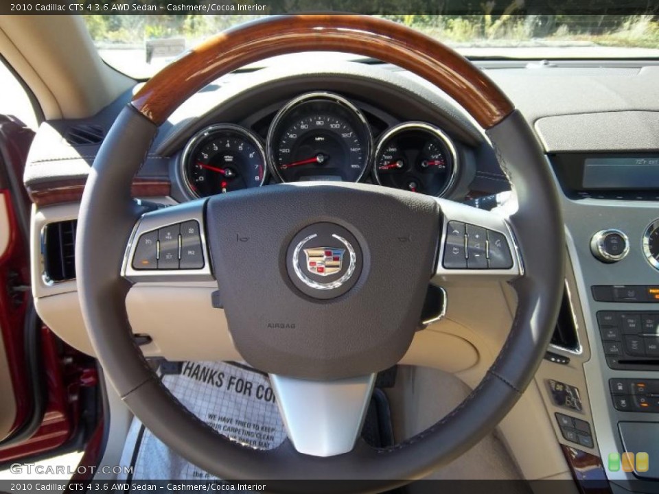 Cashmere/Cocoa Interior Steering Wheel for the 2010 Cadillac CTS 4 3.6 AWD Sedan #37791008