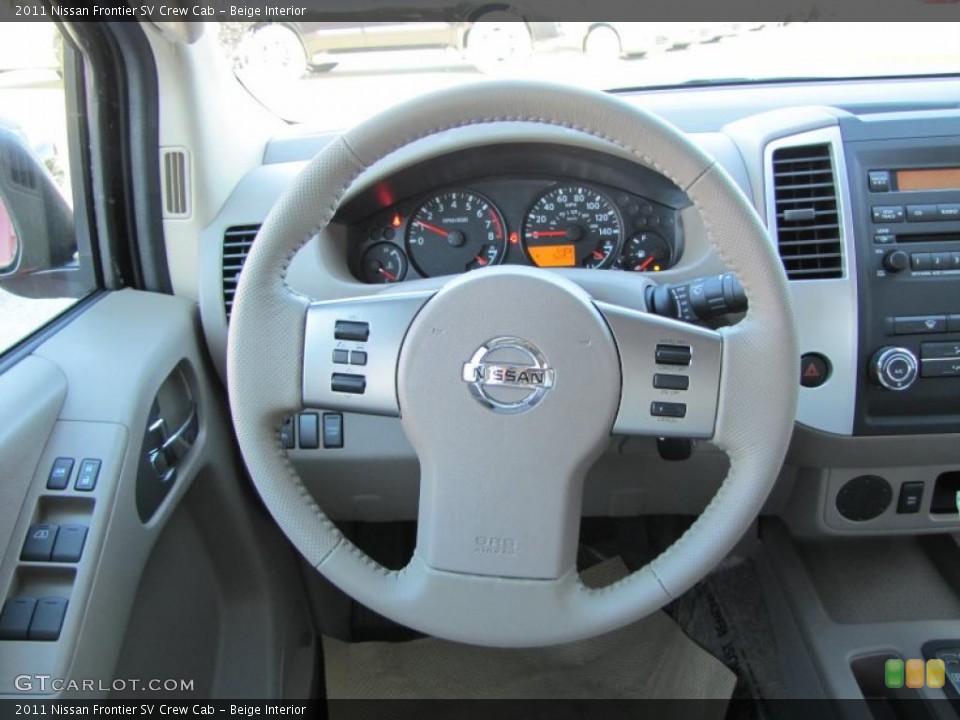 Beige Interior Steering Wheel for the 2011 Nissan Frontier SV Crew Cab #37800764