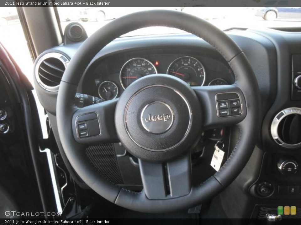Black Interior Steering Wheel for the 2011 Jeep Wrangler Unlimited Sahara 4x4 #37807764