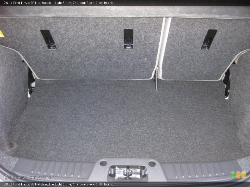 Light Stone/Charcoal Black Cloth Interior Trunk for the 2011 Ford Fiesta SE Hatchback #37889436