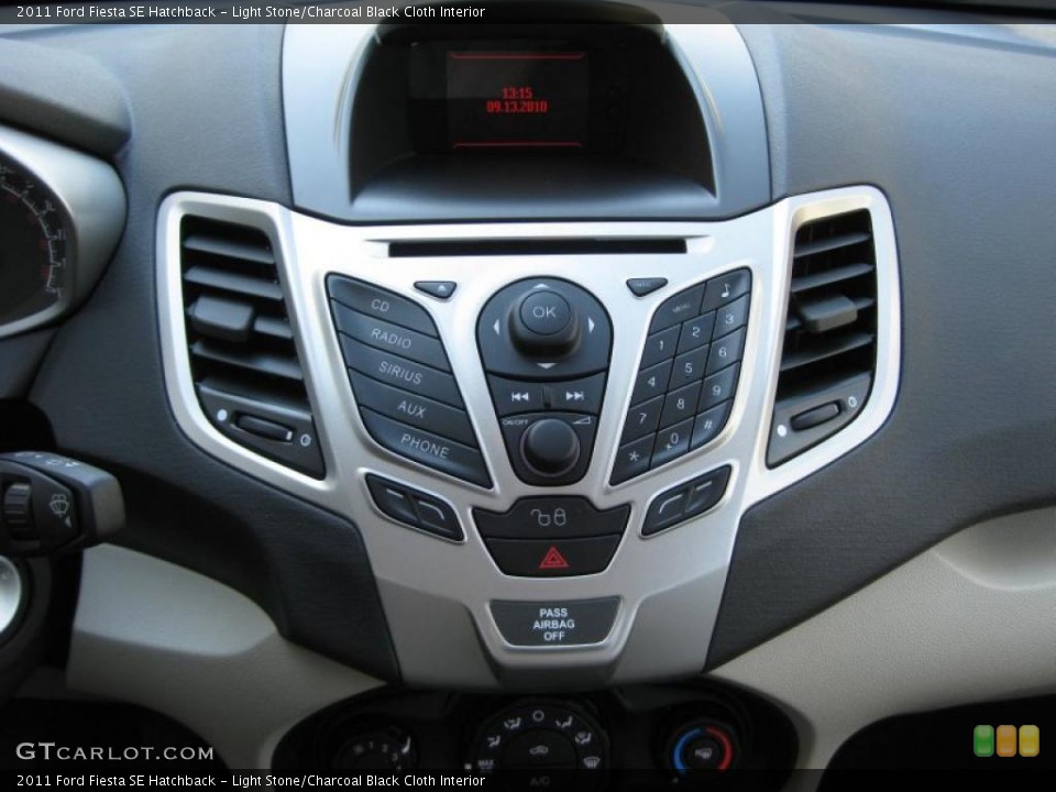 Light Stone/Charcoal Black Cloth Interior Controls for the 2011 Ford Fiesta SE Hatchback #37889672
