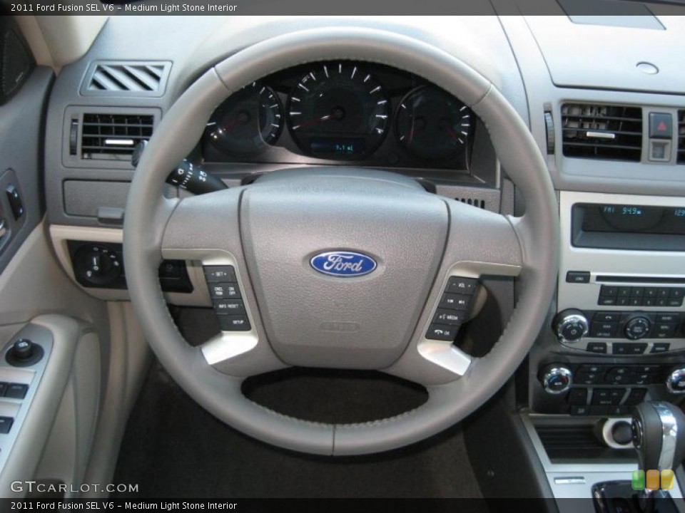 Medium Light Stone Interior Steering Wheel for the 2011 Ford Fusion SEL V6 #37895708
