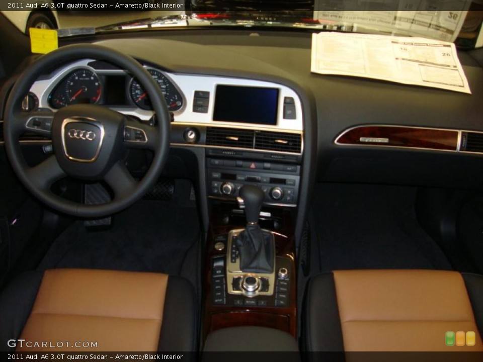 Amaretto/Black Interior Dashboard for the 2011 Audi A6 3.0T quattro Sedan #37910785