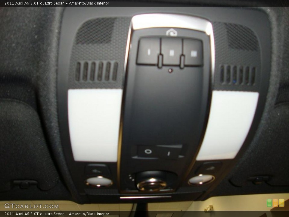 Amaretto/Black Interior Controls for the 2011 Audi A6 3.0T quattro Sedan #37910905