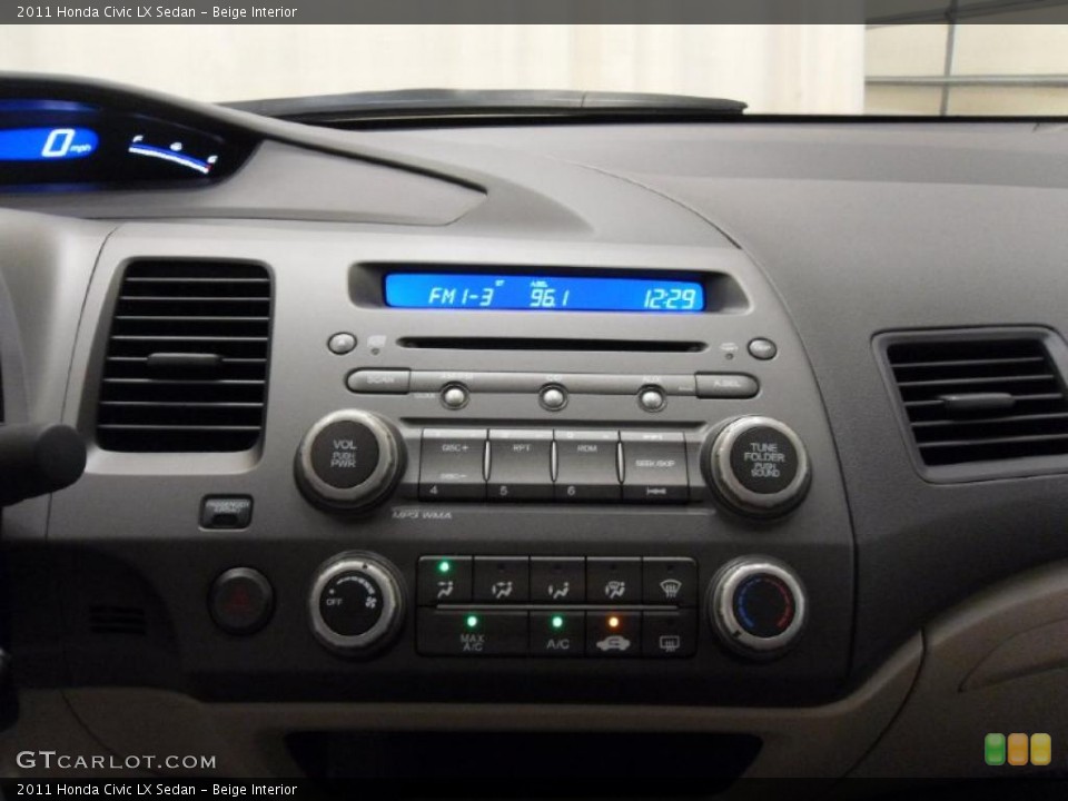 Beige Interior Controls for the 2011 Honda Civic LX Sedan #37914398