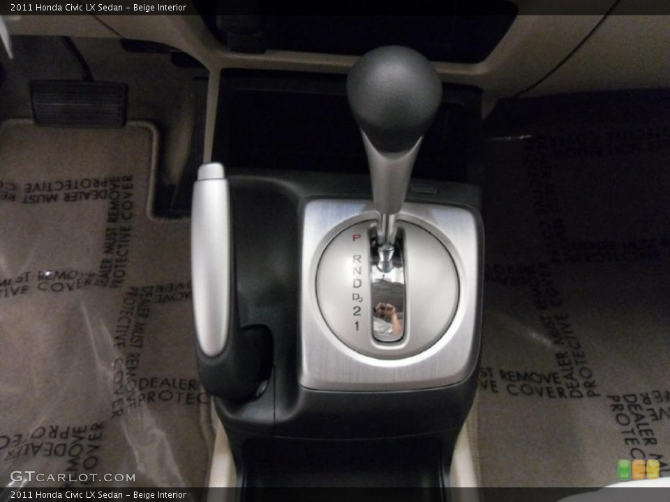 Beige Interior Transmission for the 2011 Honda Civic LX Sedan #37914414