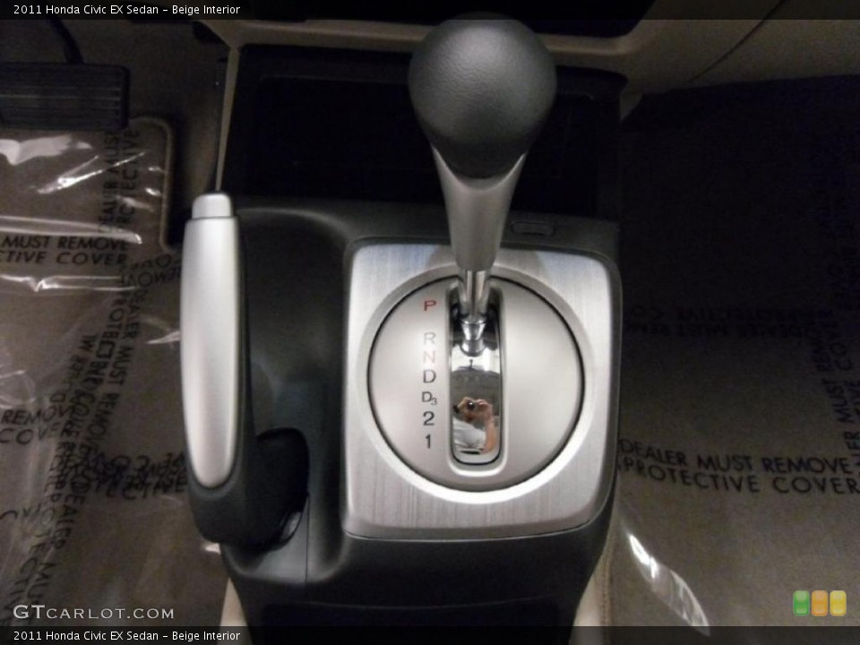 Beige Interior Transmission for the 2011 Honda Civic EX Sedan #37917414