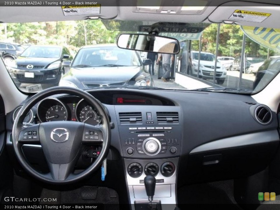 Black Interior Dashboard for the 2010 Mazda MAZDA3 i Touring 4 Door #37921578