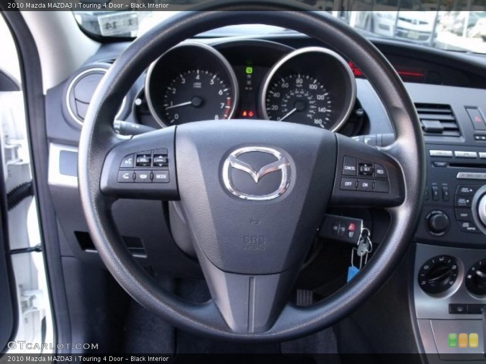 Black Interior Steering Wheel for the 2010 Mazda MAZDA3 i Touring 4 Door #37921594