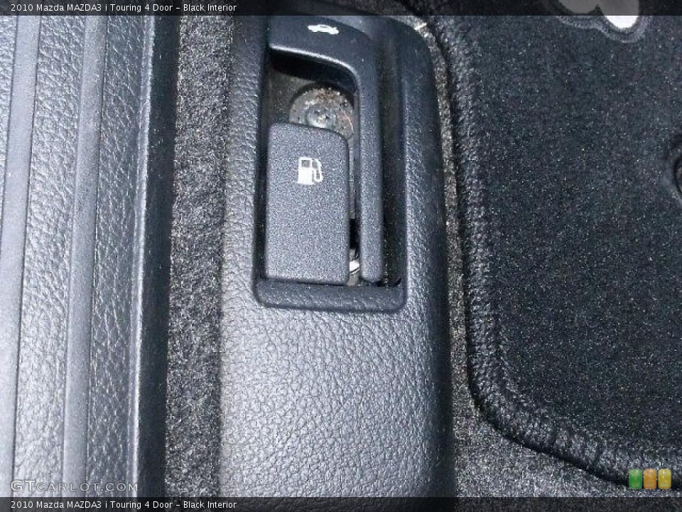 Black Interior Controls for the 2010 Mazda MAZDA3 i Touring 4 Door #37921750
