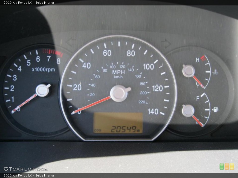 Beige Interior Gauges for the 2010 Kia Rondo LX #37935774