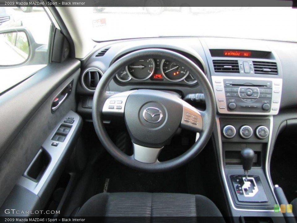Black Interior Steering Wheel for the 2009 Mazda MAZDA6 i Sport #37949048