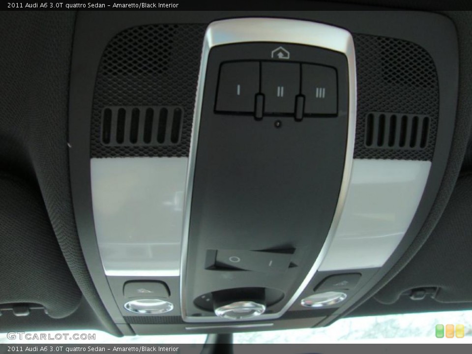 Amaretto/Black Interior Controls for the 2011 Audi A6 3.0T quattro Sedan #37964200