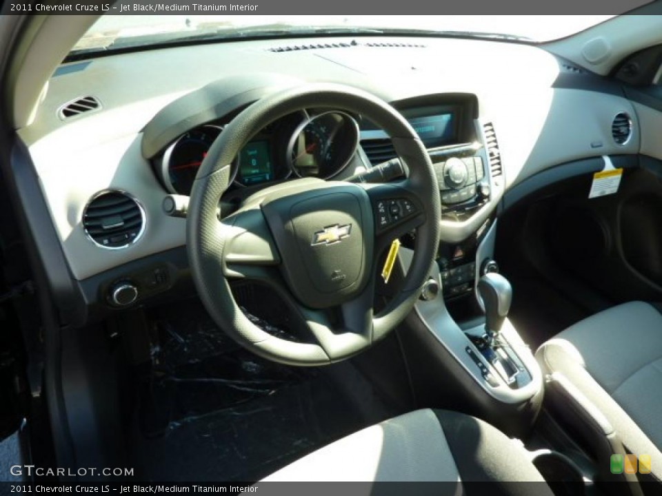 Jet Black/Medium Titanium Interior Dashboard for the 2011 Chevrolet Cruze LS #37970196