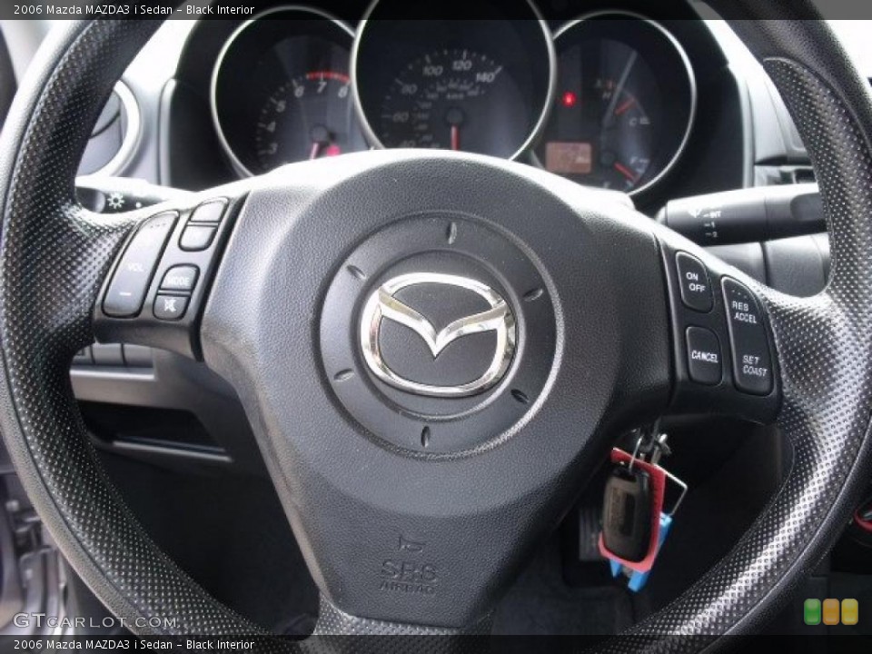 Black Interior Steering Wheel for the 2006 Mazda MAZDA3 i Sedan #37978136