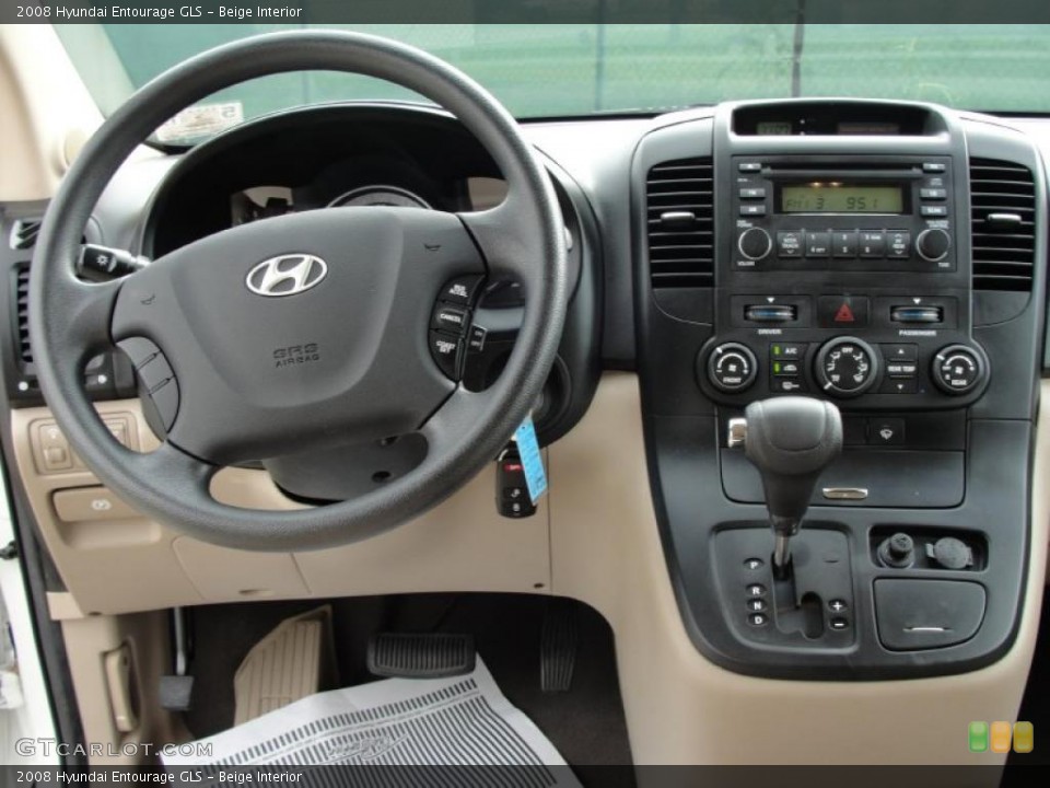 Beige Interior Dashboard for the 2008 Hyundai Entourage GLS #37994809