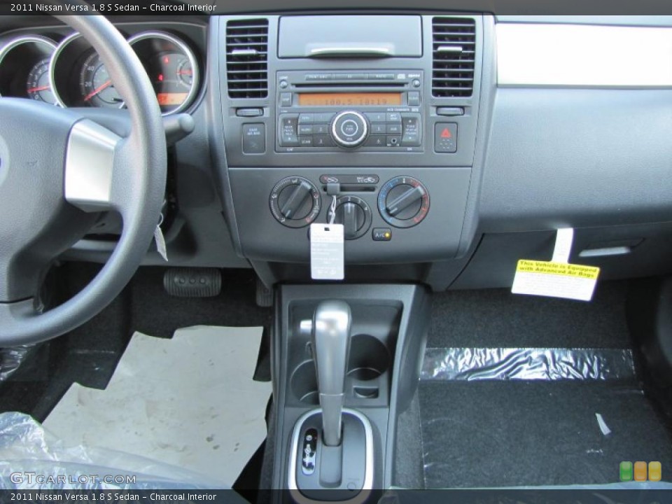 Charcoal Interior Controls for the 2011 Nissan Versa 1.8 S Sedan #38004178