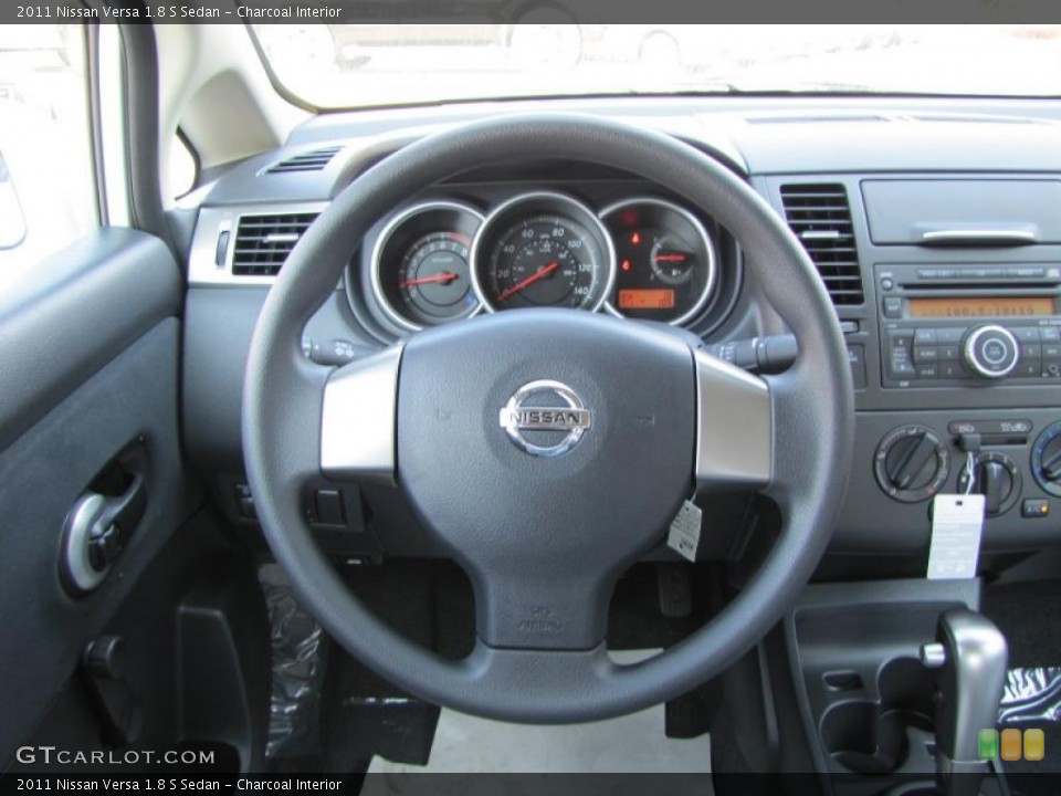 Charcoal Interior Steering Wheel for the 2011 Nissan Versa 1.8 S Sedan #38004194