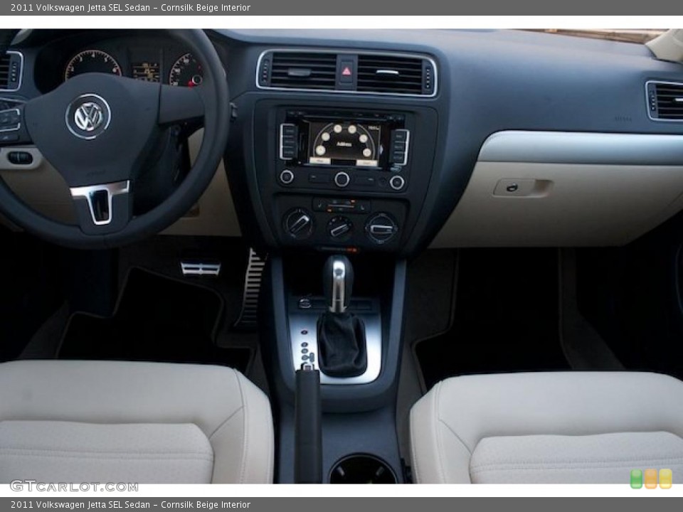 Cornsilk Beige Interior Dashboard for the 2011 Volkswagen Jetta SEL Sedan #38008689