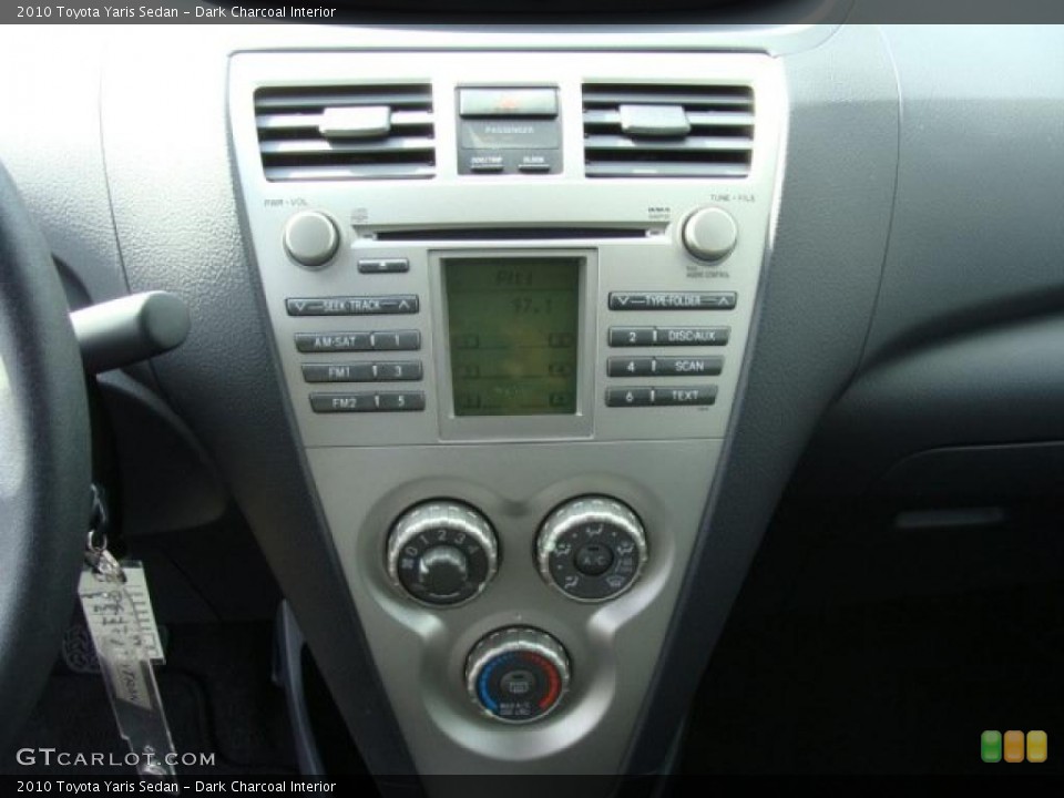 Dark Charcoal Interior Controls for the 2010 Toyota Yaris Sedan #38023532