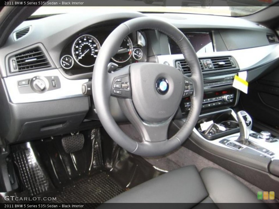 Black Interior Dashboard for the 2011 BMW 5 Series 535i Sedan #38044179