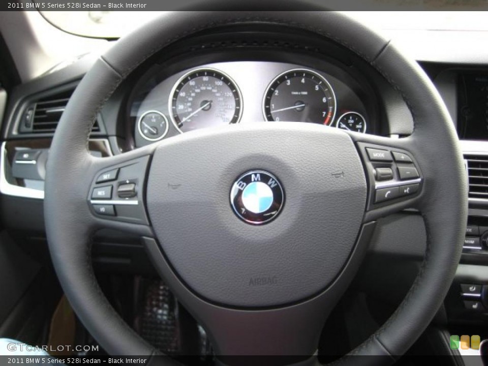 Black Interior Steering Wheel for the 2011 BMW 5 Series 528i Sedan #38044583