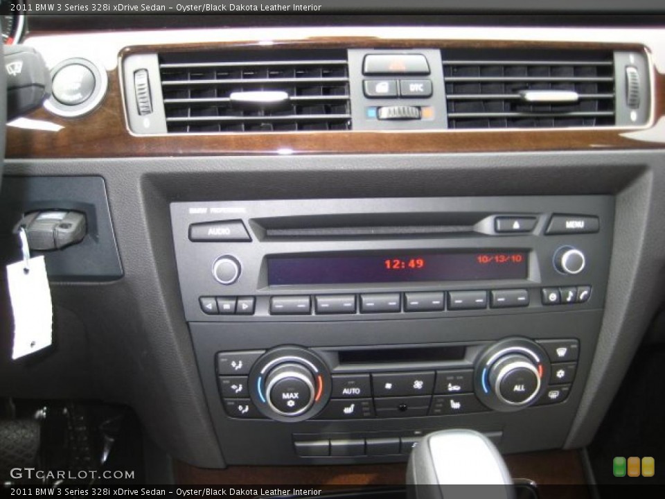 Oyster/Black Dakota Leather Interior Controls for the 2011 BMW 3 Series 328i xDrive Sedan #38045131