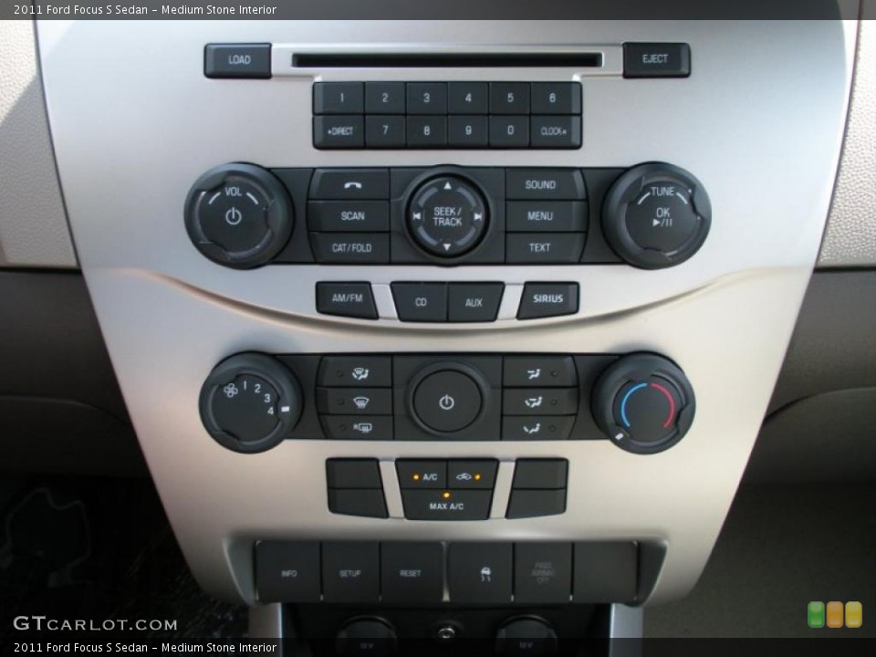 Medium Stone Interior Controls for the 2011 Ford Focus S Sedan #38061696