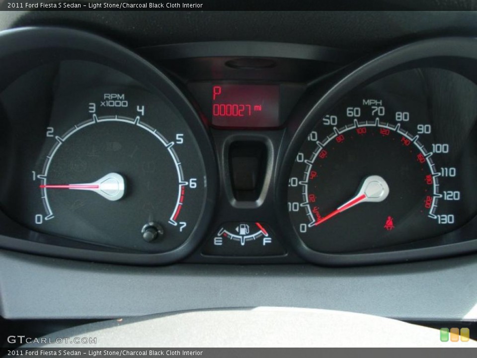 Light Stone/Charcoal Black Cloth Interior Gauges for the 2011 Ford Fiesta S Sedan #38061856
